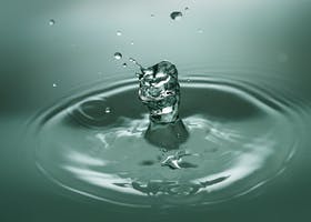 Close-up of Drop Splashing in Water